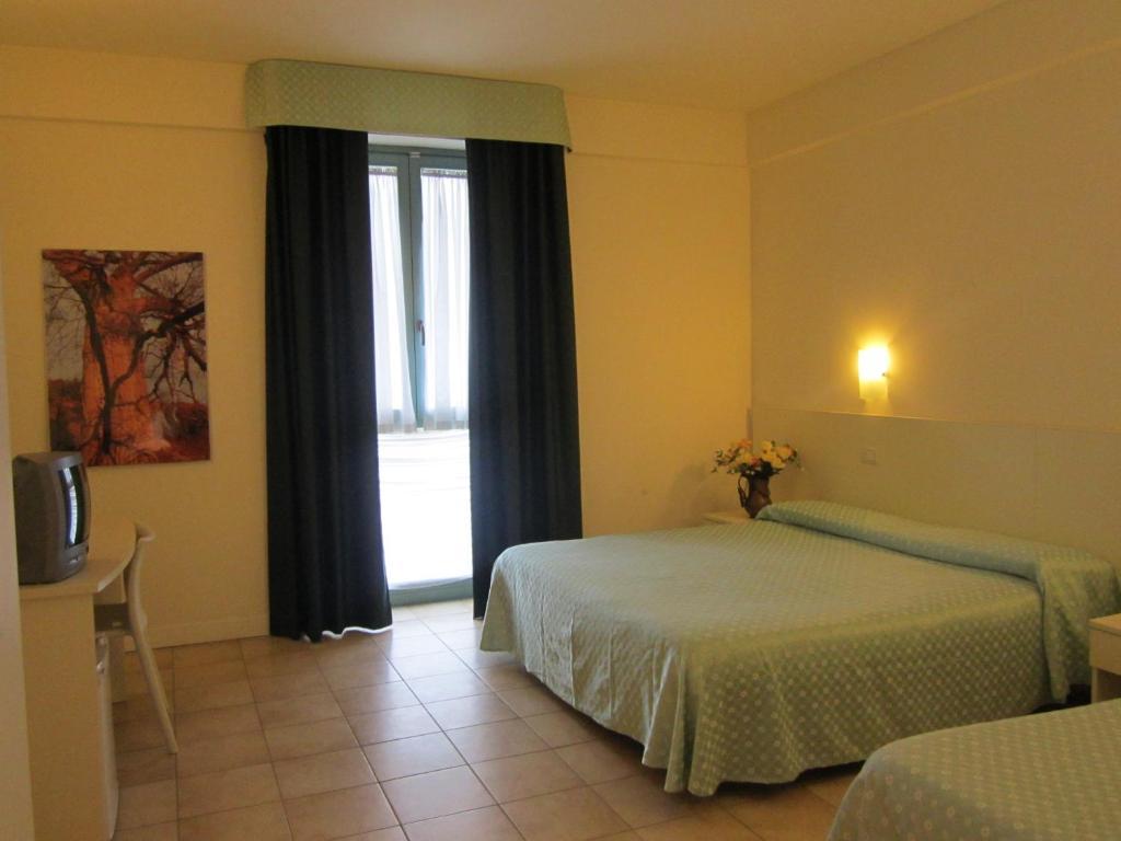 Lieta Sosta Hotell Colfiorito Rum bild